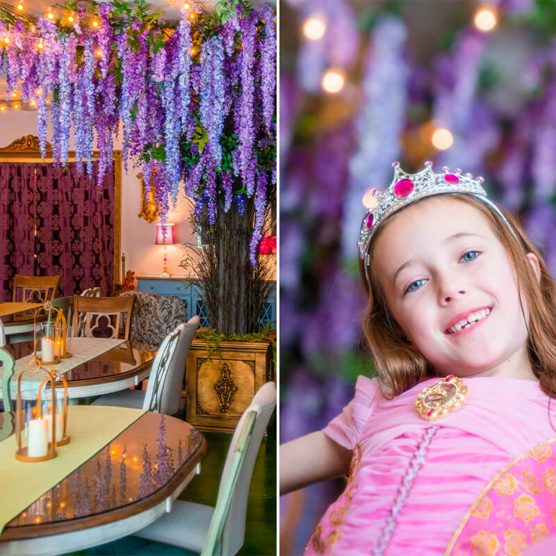 Photo of inside the venue featuring a magical looking tree and a little girl dressed like a princess.